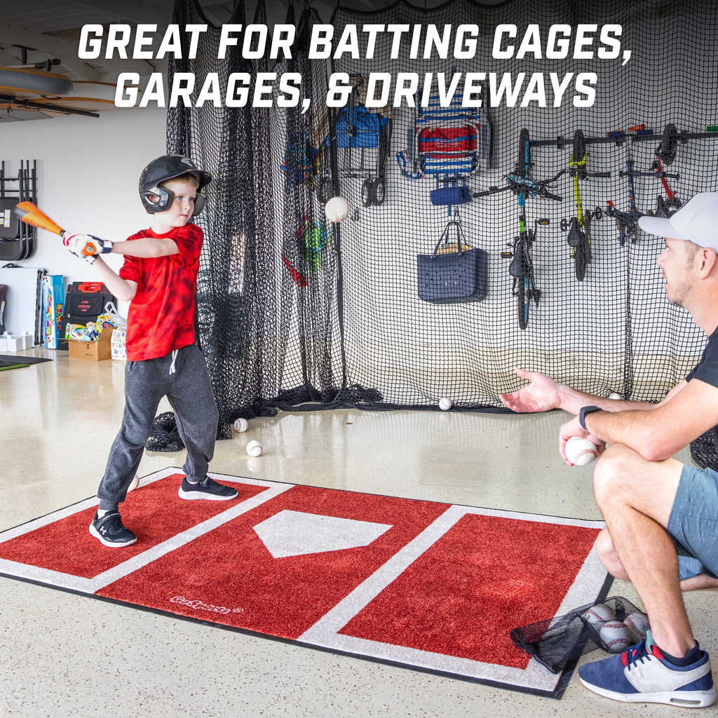 a man and a little boy playing baseball