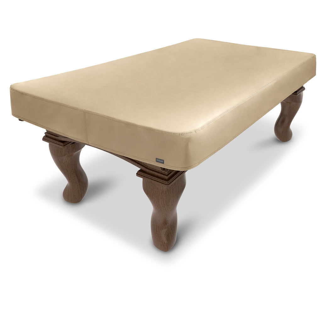 a wooden ottoman with a beige cover