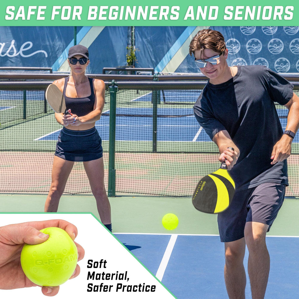 a man and woman playing tennis on a tennis court