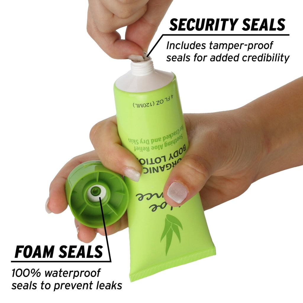 a hand holding a bottle of soap with a green lid